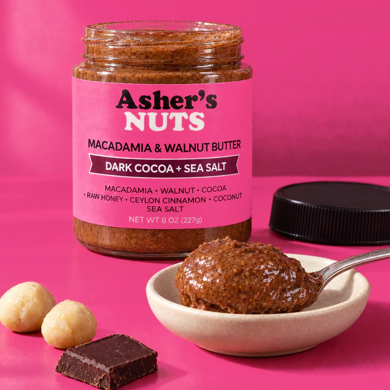 Open jar with a spoonful of the spread in a dish