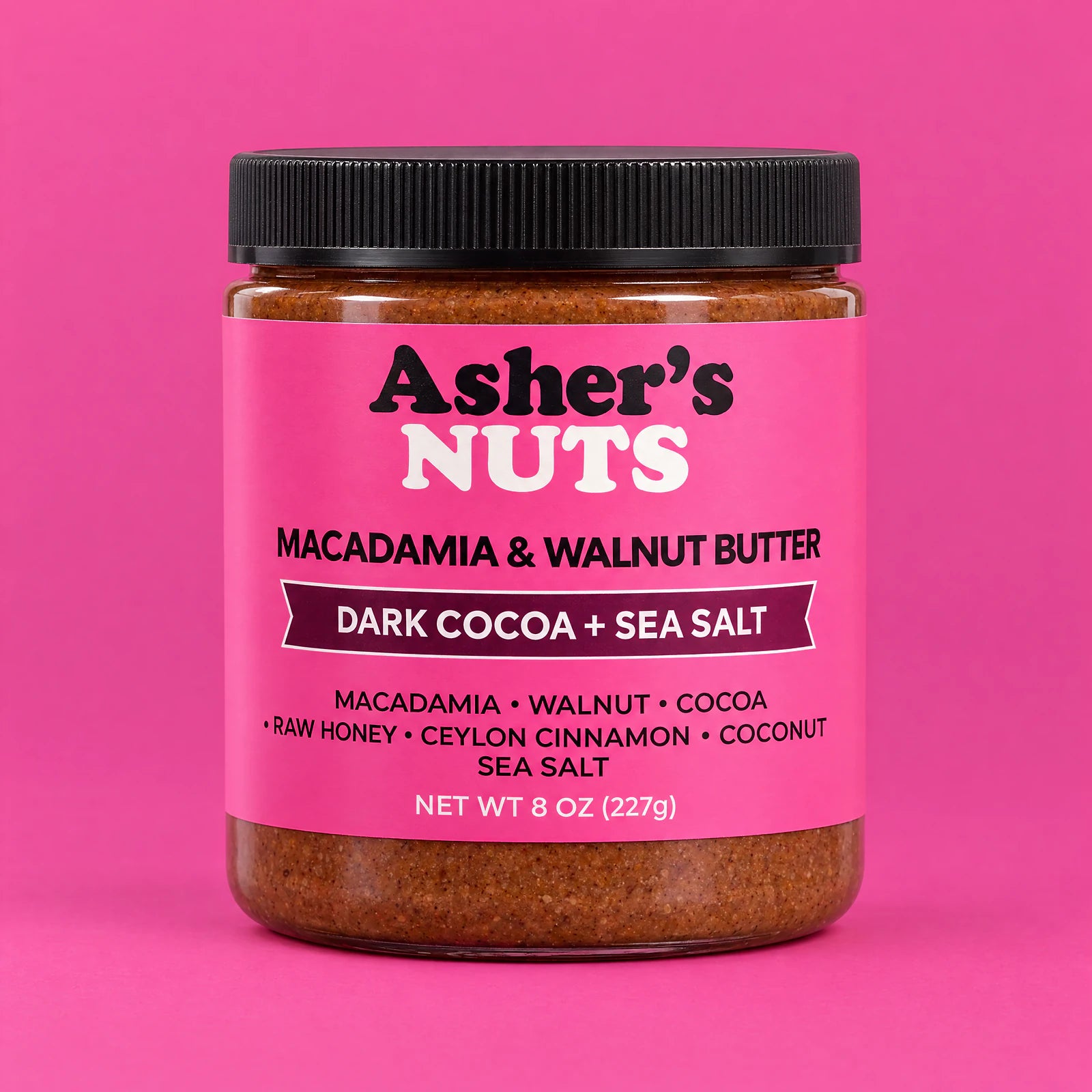 A jar of Asher's Nuts Dark Cocoa + Sea Salt macadamia and walnut butter